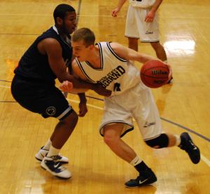 Eric Dye/The Behrend Beacon photo: Behrend junior Patrick St. Andrews drives to the hoop against Penn State Altoona.  St. Andrews, Nick Thorsen, and Russ Conley all recorded 15 points in Saturday's game.